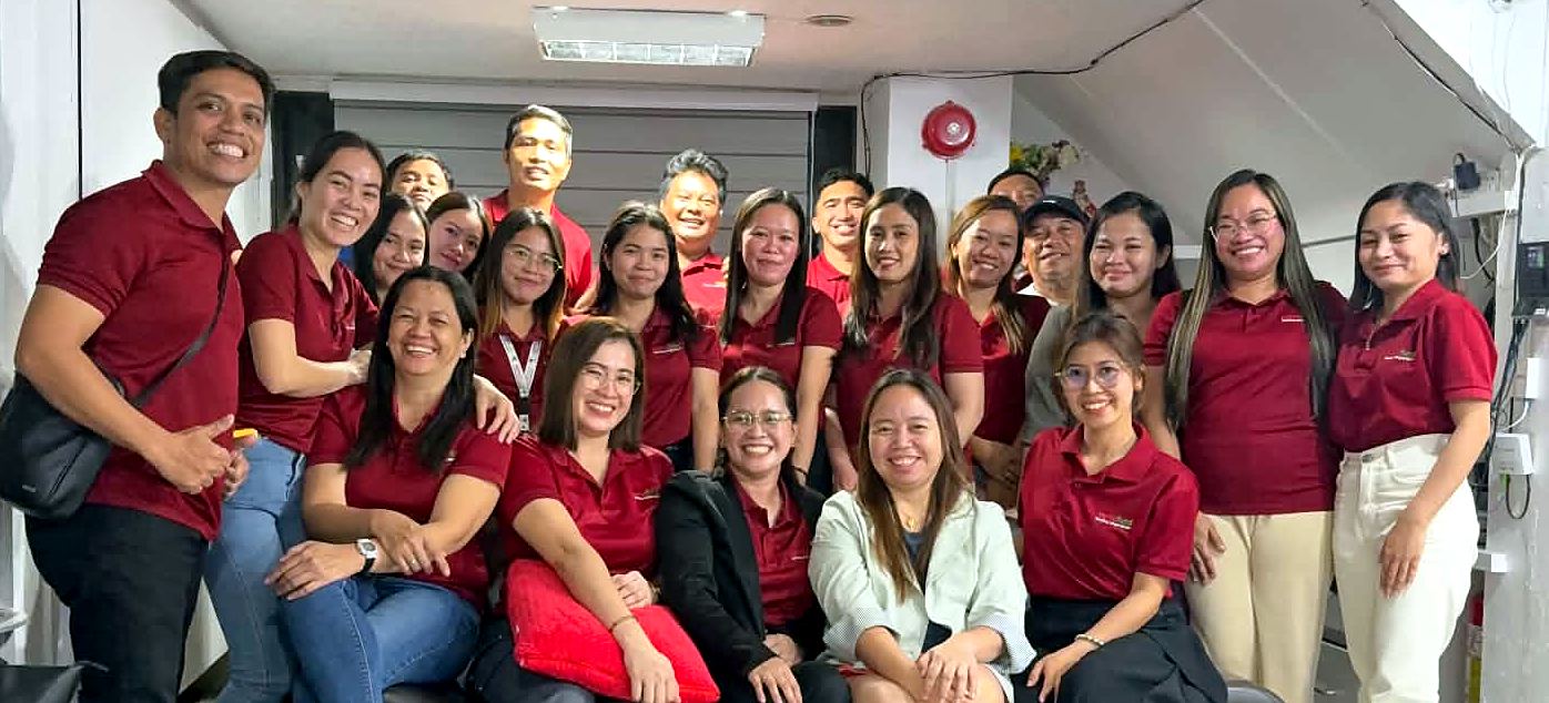The Samofund branch team in their maroon uniforms